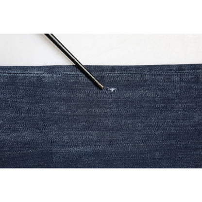 Close-up of fabric detail on Prada Dark Blue Mid Waist Skinny Fit Men Denim Trouser Jeans.