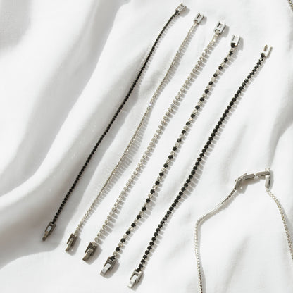 RADIANT JEWELS JEWELRY Mod. RH000011 silver and black bracelets on white background