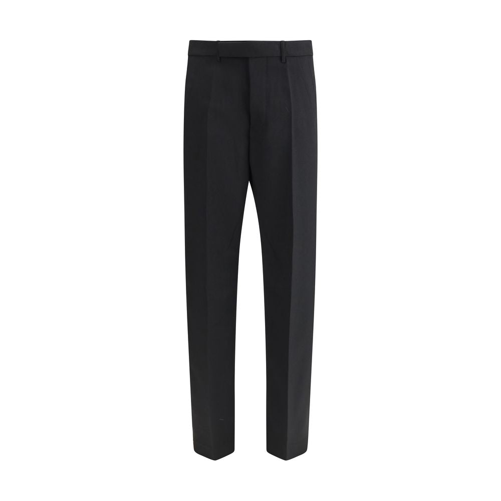 Rick Owens Black Fleece Wool Dress Pants with mid-rise, loose fit, and tailored waistband, featuring ironed pleats and back welt pockets.