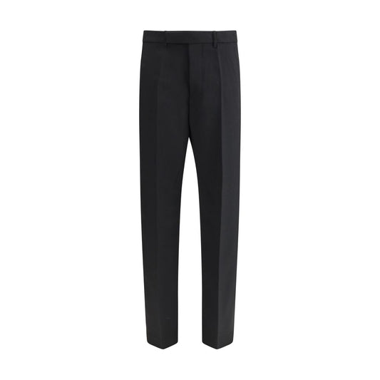 Rick Owens Black Fleece Wool Dress Pants with mid-rise, loose fit, and tailored waistband, featuring ironed pleats and back welt pockets.