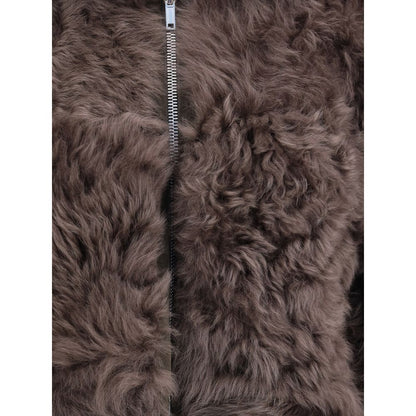 Close-up of Rick Owens Brown Lamb Leather Biker Jacket's curly fur interior and central zipper.