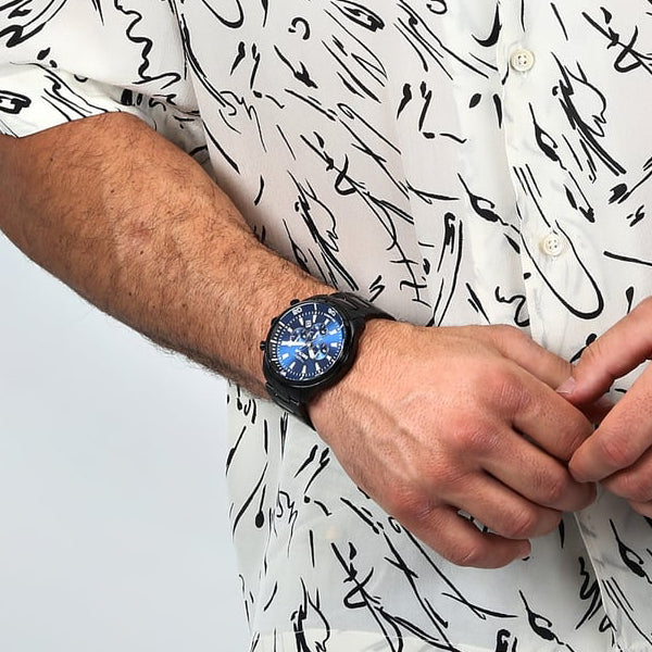 SECTOR Mod. OVERSIZE wristwatch on gentleman's wrist, 48mm stainless steel case, 10 ATM water resistance, silver chronograph watch.