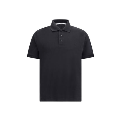 Saint Laurent Black Cotton Polo Shirt with traditional collar and three-button placket, featuring embroidered logo and regular fit.
