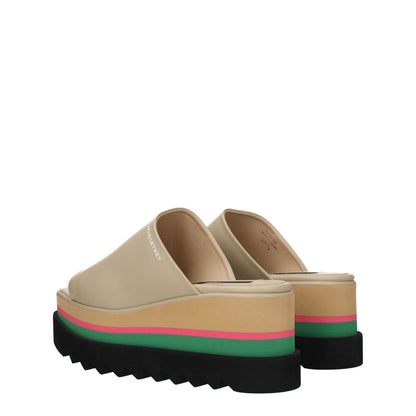 Stella McCartney Beige Leather Slippers with wedge heel, open toe, eco leather, and side logo design; casual style footwear.