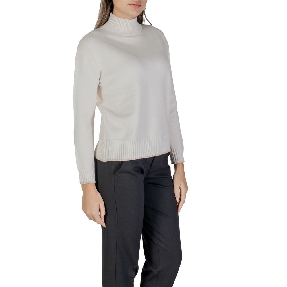 Woman wearing Street One Cream Polyester Sweatshirt with high neckline, ribbed hem, and contrasting trim for stylish comfort.