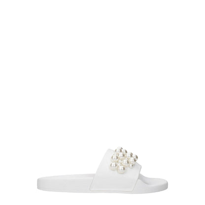 Stuart Weitzman White Leather Slippers with front detail and open toe design. Style: Street, Heel: Low and flat. MPN: GOLDIESMOSA887WHT.
