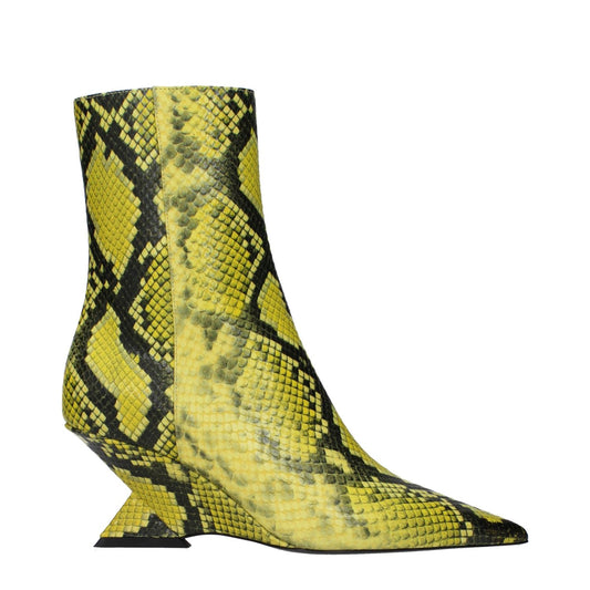 The Attico Yellow Leather Ankle Boots with snake print, mid heels, and pointy toe design, featuring zip closure, crafted from leather.