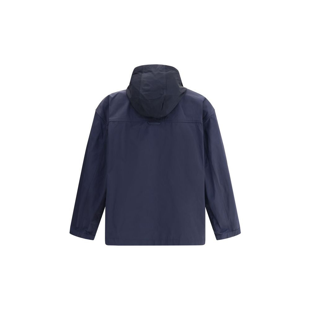 Thom Browne Blue Polyester Shell Jacket with hood and iconic striped detail, waterproof design for functional style.