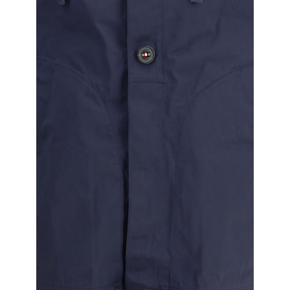 Thom Browne Blue Polyester Shell Jacket with waterproof fabric and striped grosgrain detail.