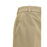 Side view of Thom Browne Cotton Pants with hook, button closure and welt pockets, showcasing refined straight-leg silhouette.