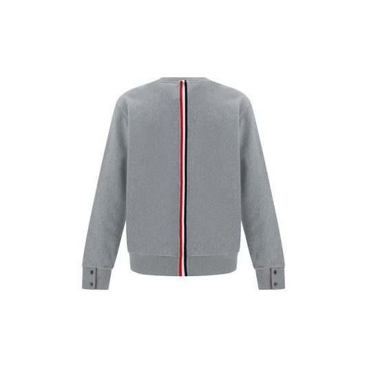 Back view of Thom Browne Sweatshirt with iconic stripe band, ribbed cuffs with buttons, and logo patch. 100% cotton, AW25 collection.