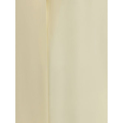 Close-up of the luxurious fabric of the Tom Ford Cream Silk Blouse, showcasing its elegant and refined design for special occasions.