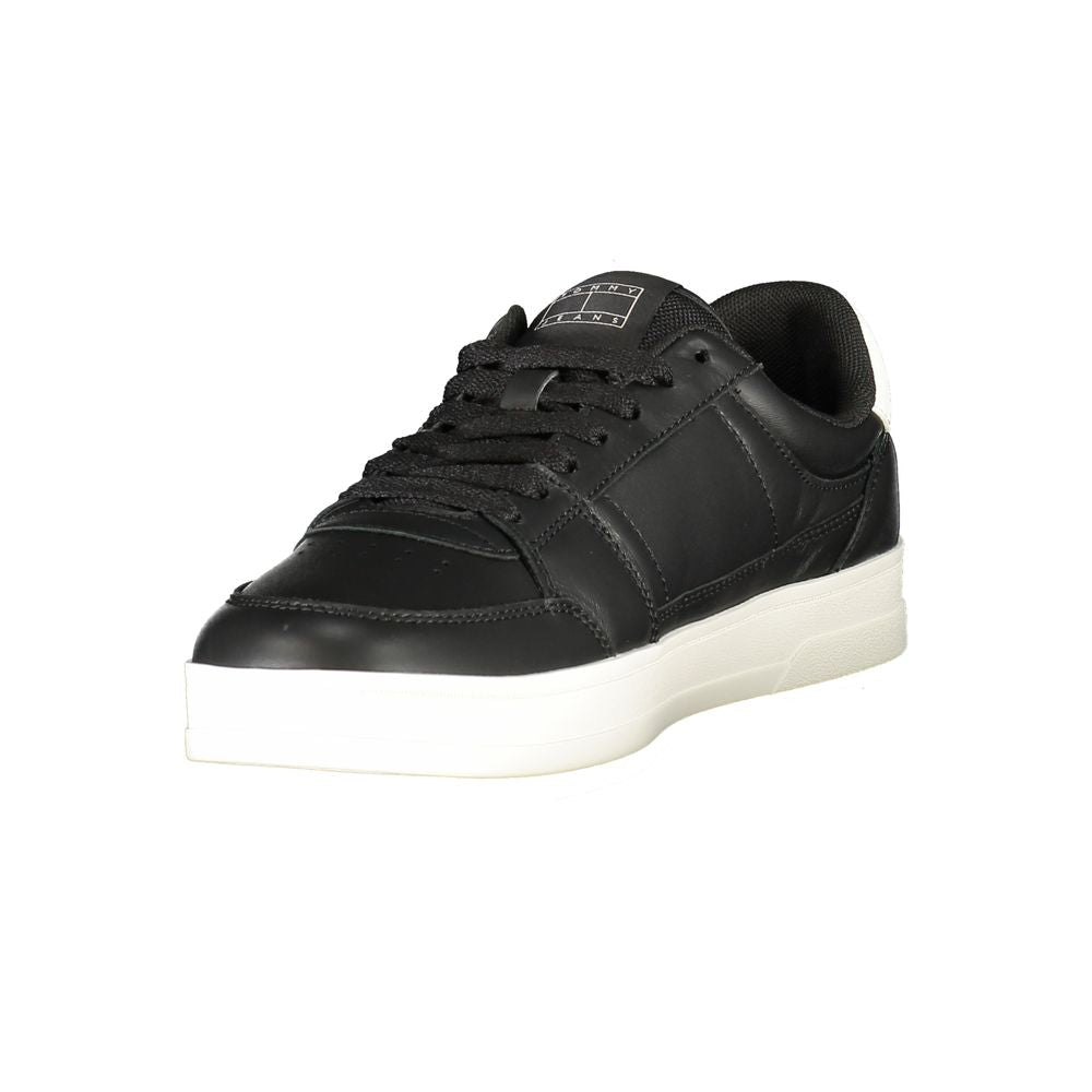Tommy Hilfiger Black Leather Men Sneaker with white sole and contrasting details, featuring removable insole and iconic logo.