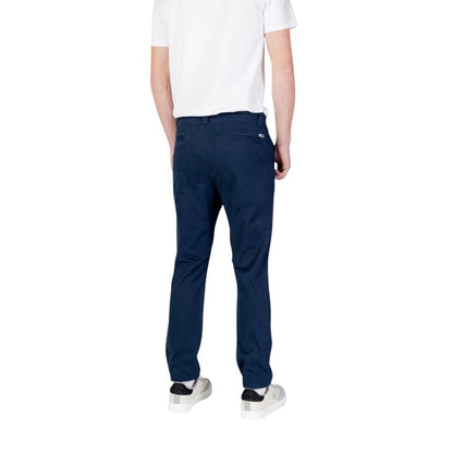 Back view of Tommy Hilfiger Jeans Blue Cotton Skinny Pants on a model, showcasing slim fit and modern style.