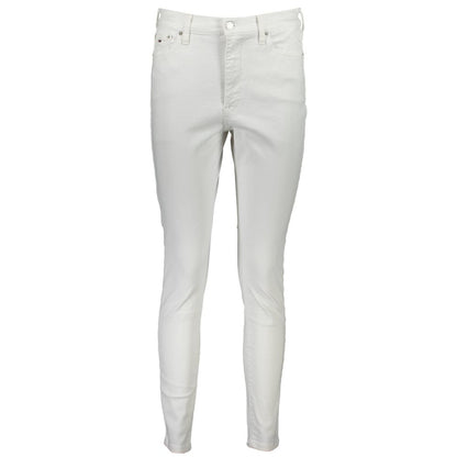 Tommy Hilfiger White Cotton Women's Jean with signature logo, button and zip closure, classic comfort and contemporary flair.