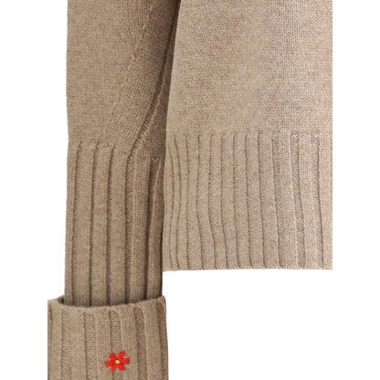 Tory Burch Beige Merino Wool Sweatshirt with floral embroidery on the cuff, showcasing premium lightweight warmth and elegance.