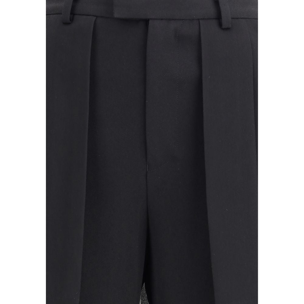 Close-up view of Undercover Black Acetate Casual Pants showing pleated structure and sophisticated design.