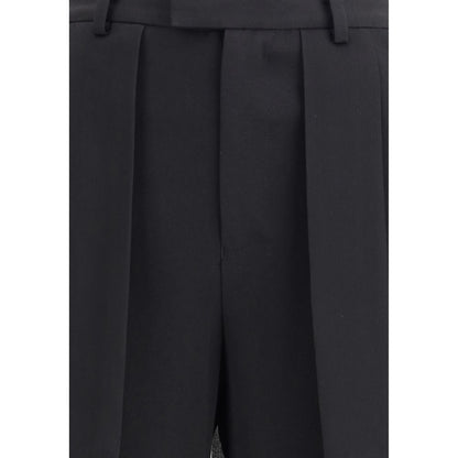 Close-up view of Undercover Black Acetate Casual Pants showing pleated structure and sophisticated design.