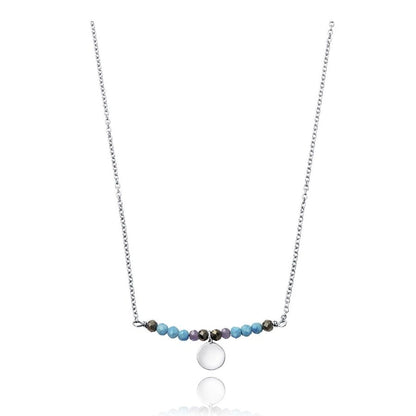 Elegant necklace with turquoise and purple beads, featuring a silver pendant, displayed on a white background.