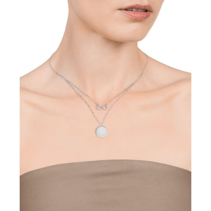 Woman wearing VICEROY JEWELS Mod. 4087C000-00 silver necklace with quartz analog dial, 925° sterling silver, in official packaging.