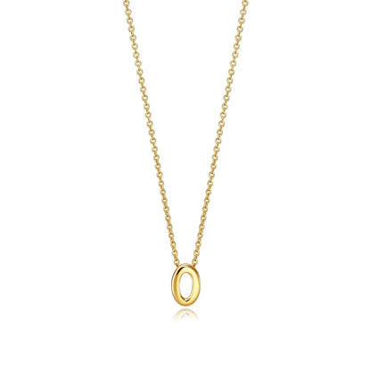 Gold necklace with a slim chain and oval pendant for women.