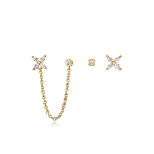 Stylish gold chain earrings with crystal accents, featuring delicate star designs and a minimalist look.