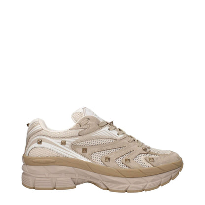 Valentino Garavani Beige Fabric Low Top Sneakers with studs, lace-up closure, round toe, and mid heels. MPN S0F57HTKMXY.