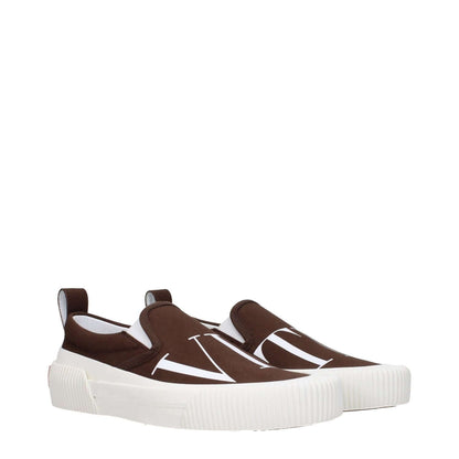 Valentino Garavani Brown Fabric Slip-On Loafers with logos, round toe, and rubber sole. Style: Casual, Color: Dark Chocolate.