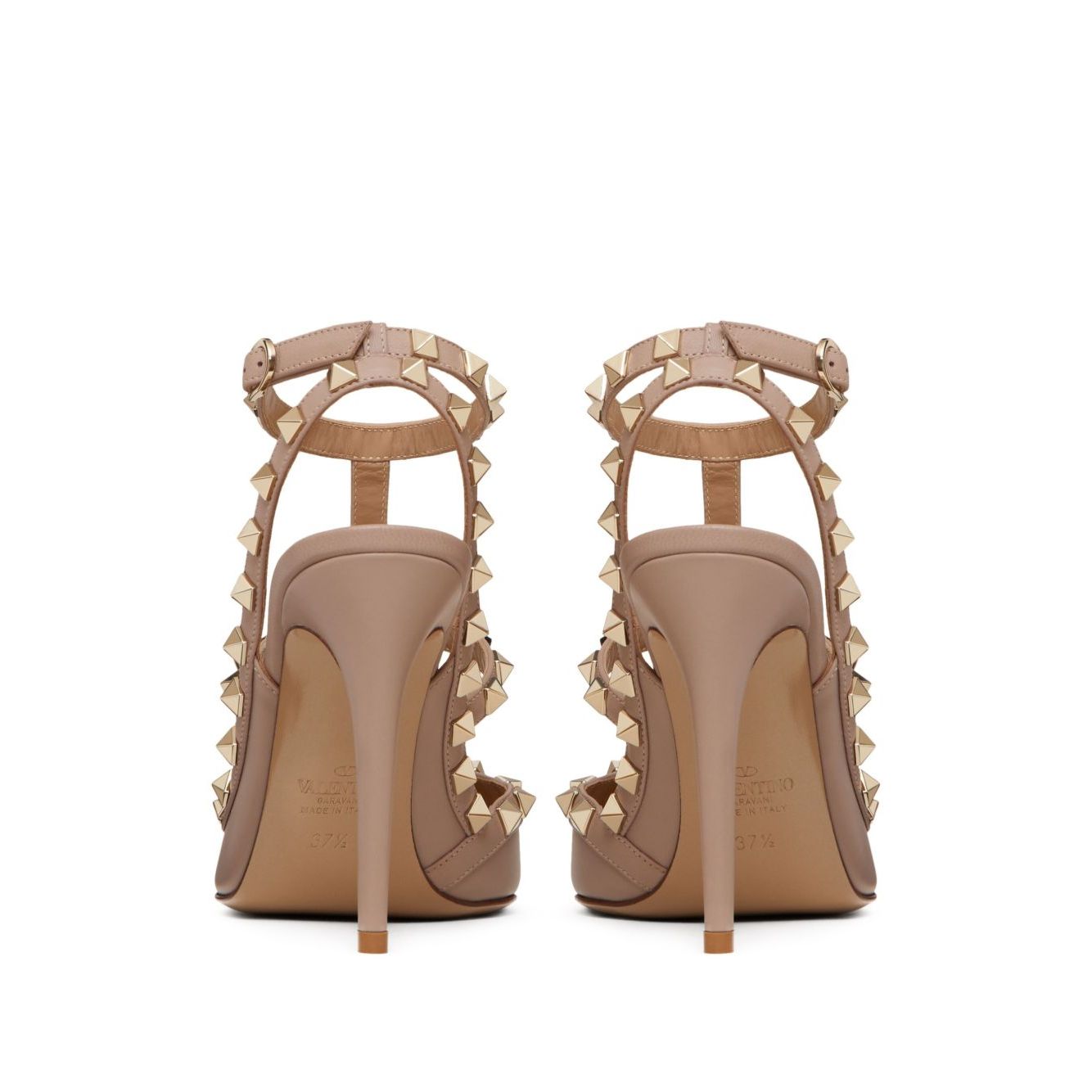 Back view of Valentino Garavani Rockstud Décolleté With 100mm Straps in powder pink leather featuring gold-tone Rockstud detailing and 100mm heels.