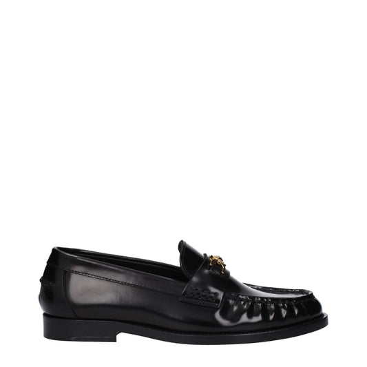 Versace Black Leather Slip-On Loafers with front logo and round toe, featuring low flat heel and leather sole, casual style.