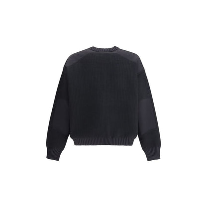 Y-3 Black Wool Sweatshirt with ribbed cuffs and hem, showcasing a relaxed fit and urban design.