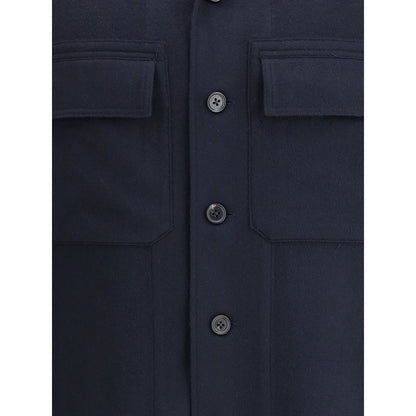 Close-up of button details on ZEGNA Blue Cashmere Coat with flap pockets.